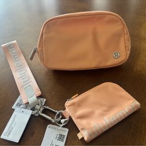 NWT lululemon card holder and NWT never lost keychain w/ bag Price is for bag